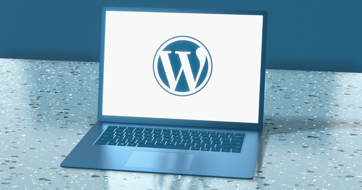Laptop displaying the WordPress logo